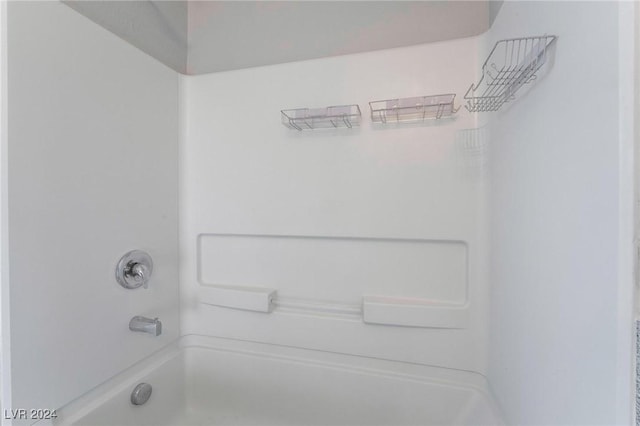 bathroom with shower / washtub combination