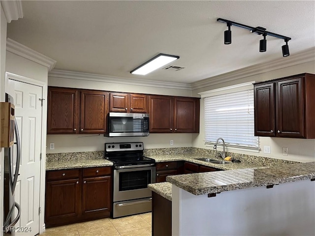 kitchen with kitchen peninsula, ornamental molding, stainless steel appliances, sink, and stone counters