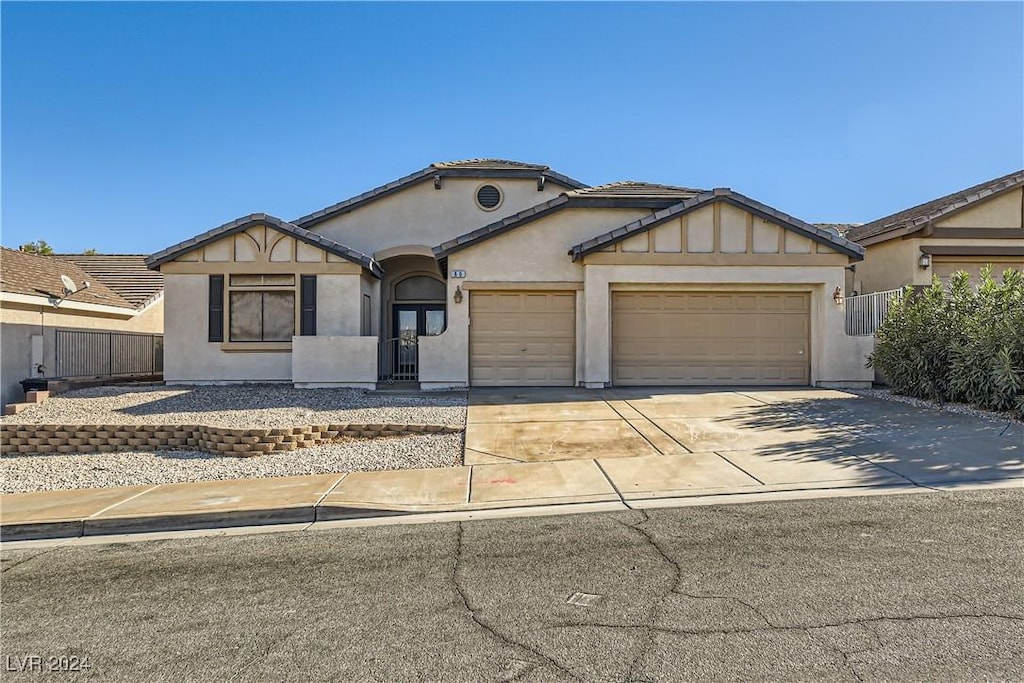 view of front of property with a garage