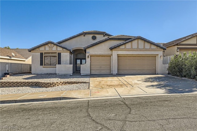 view of front of property with a garage