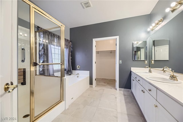 bathroom with separate shower and tub and vanity