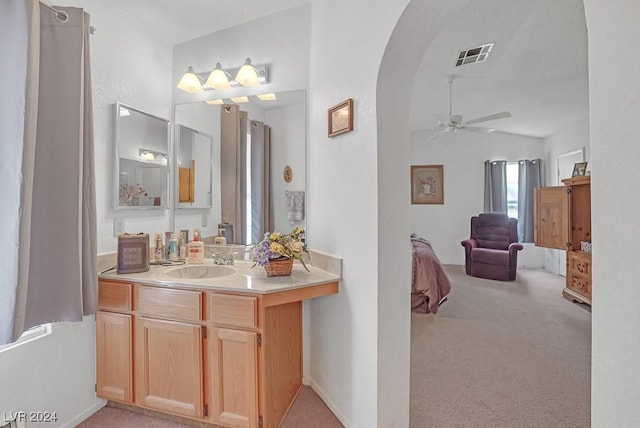 bathroom featuring vanity and ceiling fan