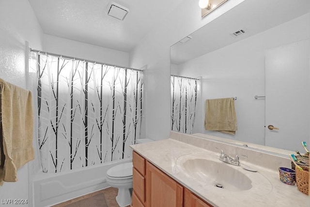 full bathroom with vanity, toilet, and shower / tub combo