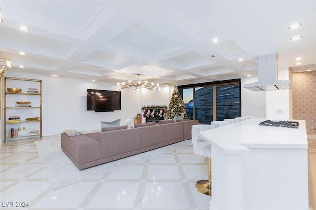 living room with beamed ceiling and a notable chandelier