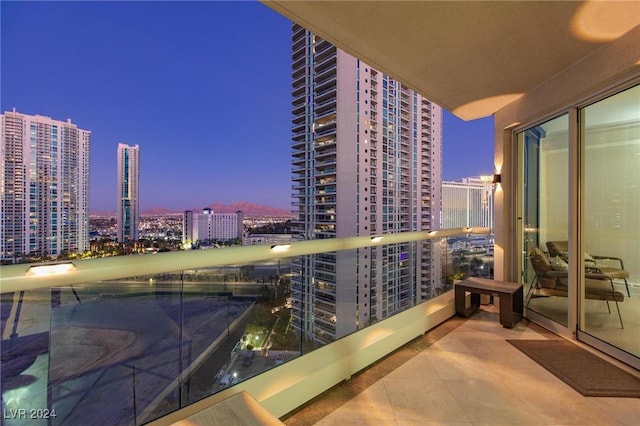 view of balcony at dusk