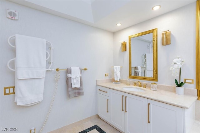 bathroom with tile patterned floors and vanity