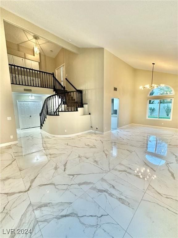 foyer with a notable chandelier