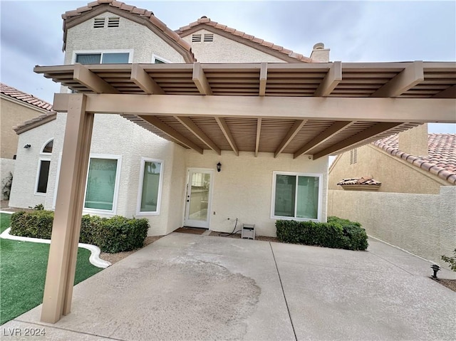 back of house featuring a patio