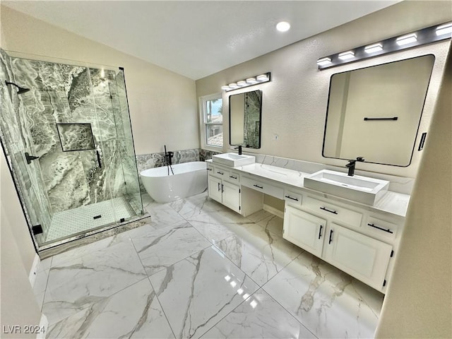 bathroom with vanity, lofted ceiling, and shower with separate bathtub