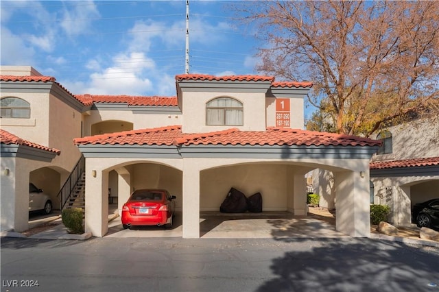 exterior space featuring a carport