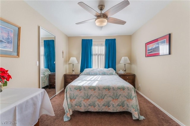 bedroom with ceiling fan and carpet floors