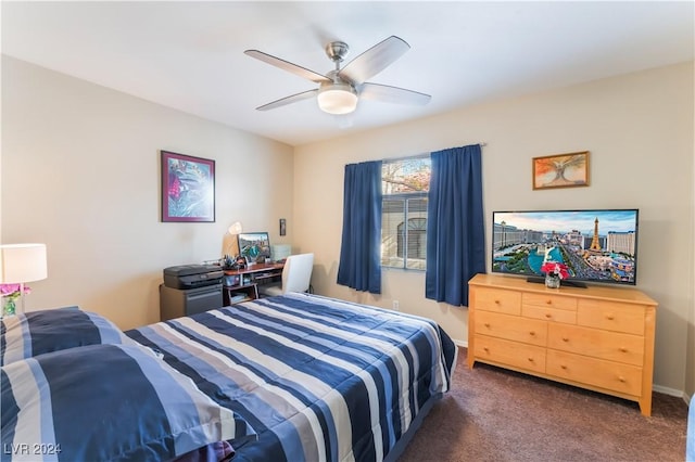 bedroom with dark colored carpet and ceiling fan