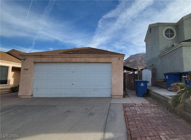 garage featuring a mountain view