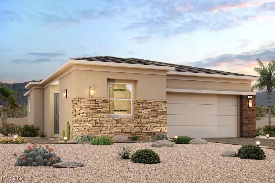 prairie-style house featuring a garage