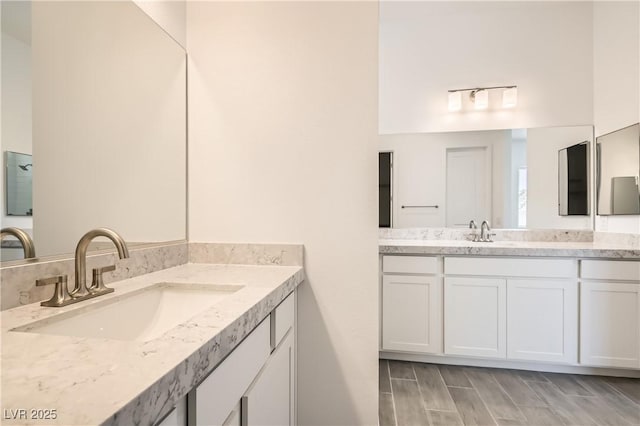106 Barkset Way, Henderson, NV 89011 - bathroom with two vanities and wood finished floors