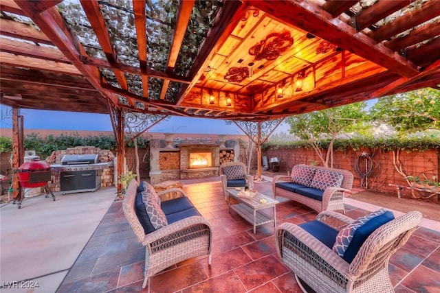 patio terrace at dusk featuring an outdoor living space with a fireplace, a gazebo, a pergola, and a grill