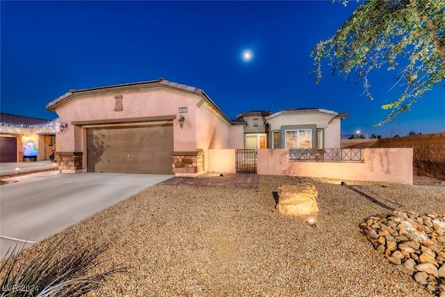 view of front of house with a garage