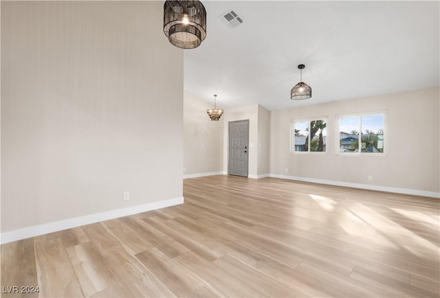 unfurnished living room with light hardwood / wood-style floors