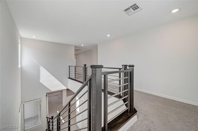 stairway with carpet flooring