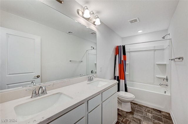 full bathroom featuring vanity, toilet, and shower / bath combo with shower curtain