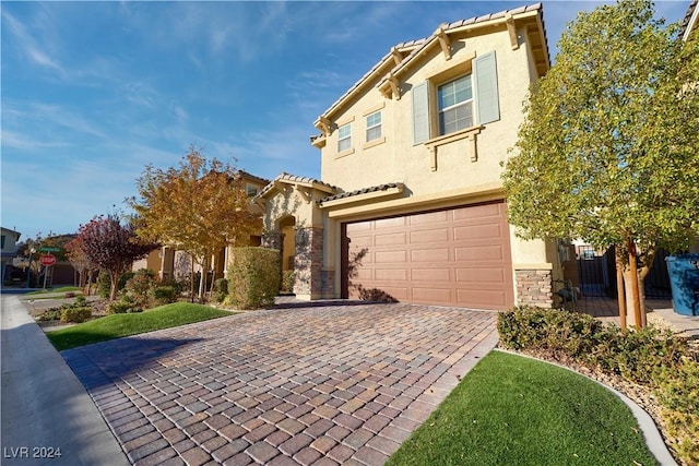 view of front of home with a garage