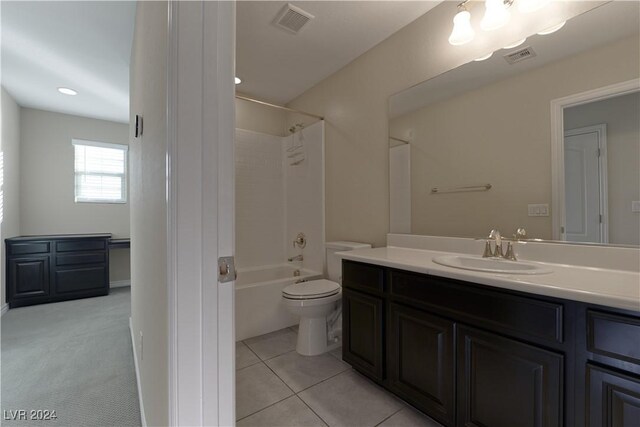 full bathroom featuring bathing tub / shower combination, tile patterned floors, vanity, and toilet