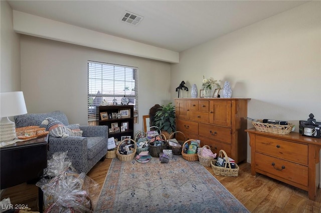 living area with wood-type flooring