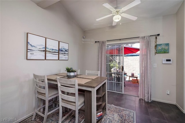 tiled dining space featuring vaulted ceiling and ceiling fan