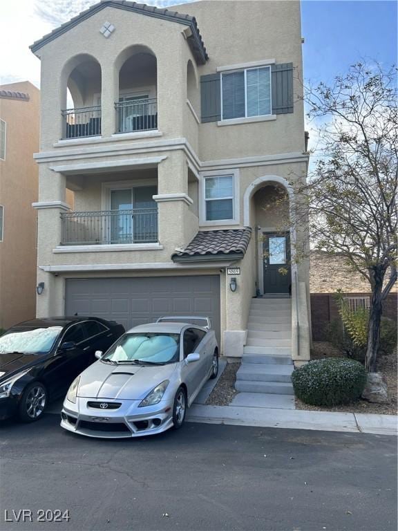 view of front of property featuring a garage