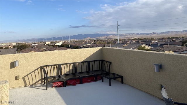 balcony featuring a mountain view