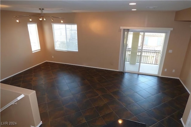 empty room featuring a wealth of natural light