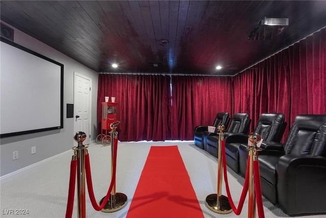 cinema featuring wooden ceiling and carpet