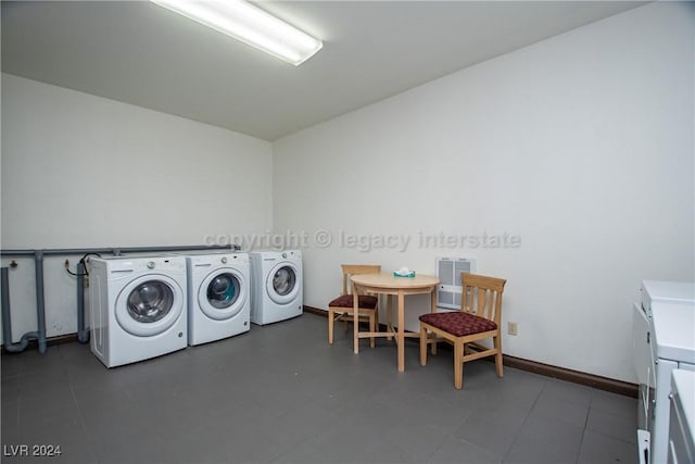 laundry room with washing machine and dryer