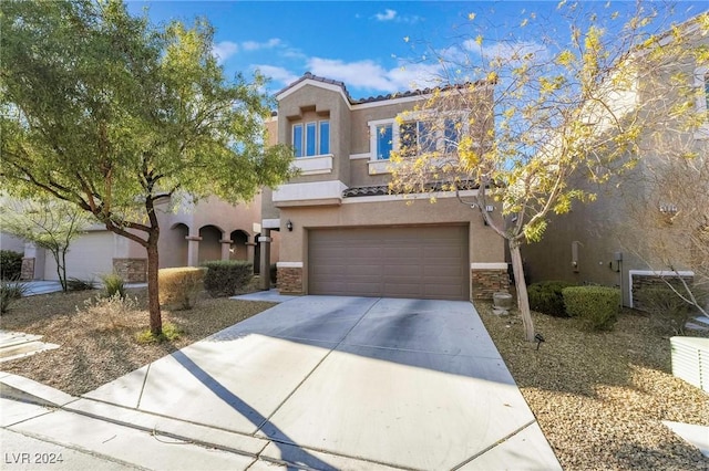 view of front of home with a garage