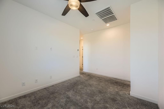 carpeted empty room featuring ceiling fan