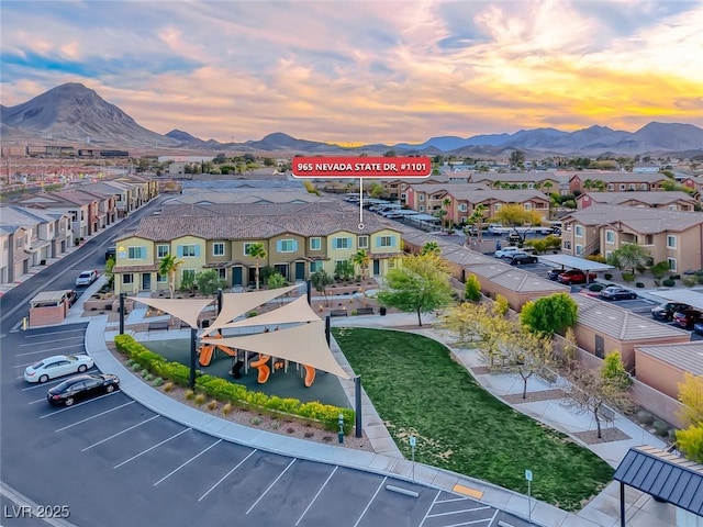 aerial view featuring a residential view and a mountain view