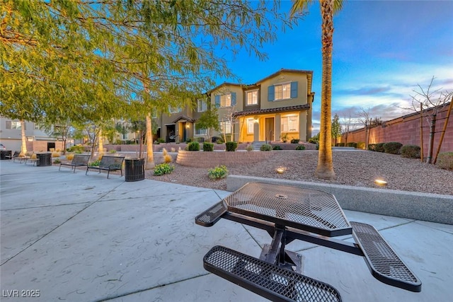 exterior space with a patio area and fence