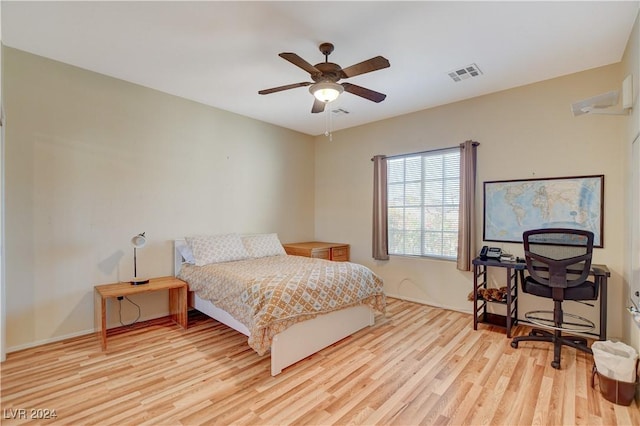 bedroom featuring light wood-type flooring and ceiling fan