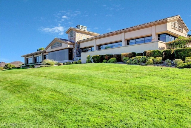 view of property exterior featuring a yard