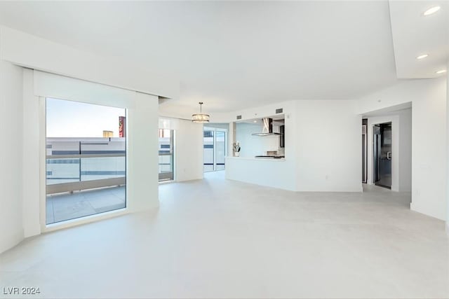 spare room featuring concrete floors