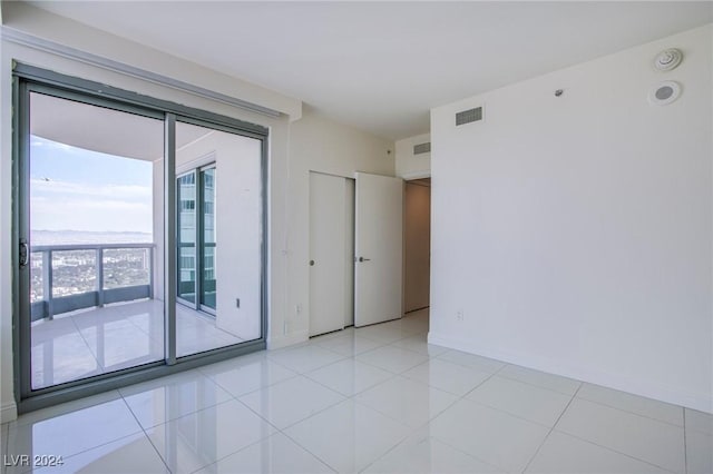 view of tiled spare room