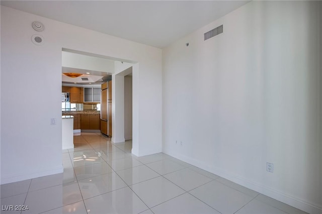 view of tiled spare room