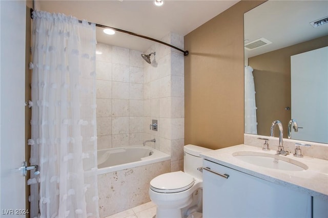 full bathroom with tile patterned flooring, shower / bath combo, toilet, and vanity