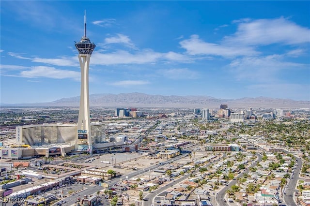 property's view of city featuring a mountain view