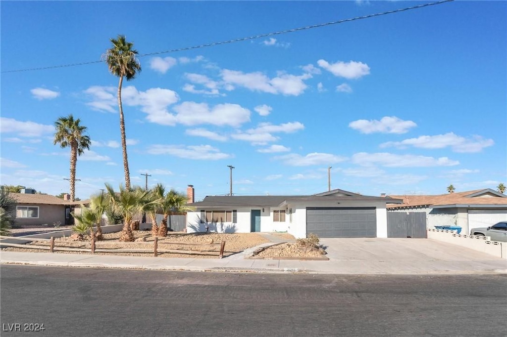 ranch-style home with a garage