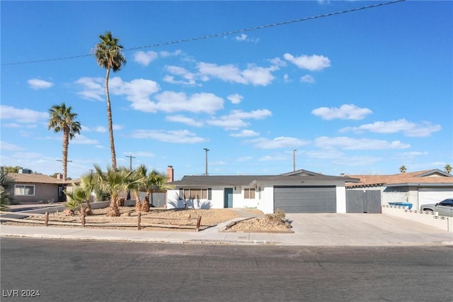 ranch-style home with a garage