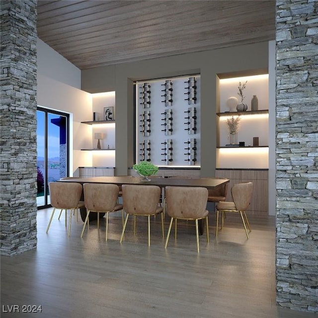 dining space with wood ceiling, vaulted ceiling, an inviting chandelier, and wood finished floors