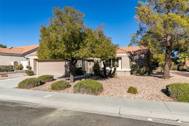 view of front of property with a garage