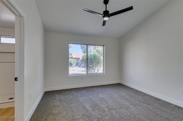 unfurnished room featuring carpet floors, ceiling fan, and lofted ceiling