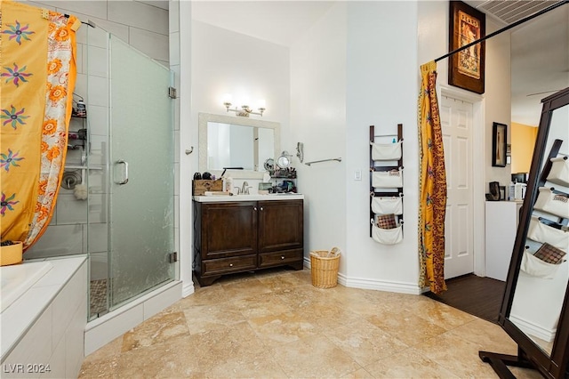 bathroom featuring vanity and plus walk in shower